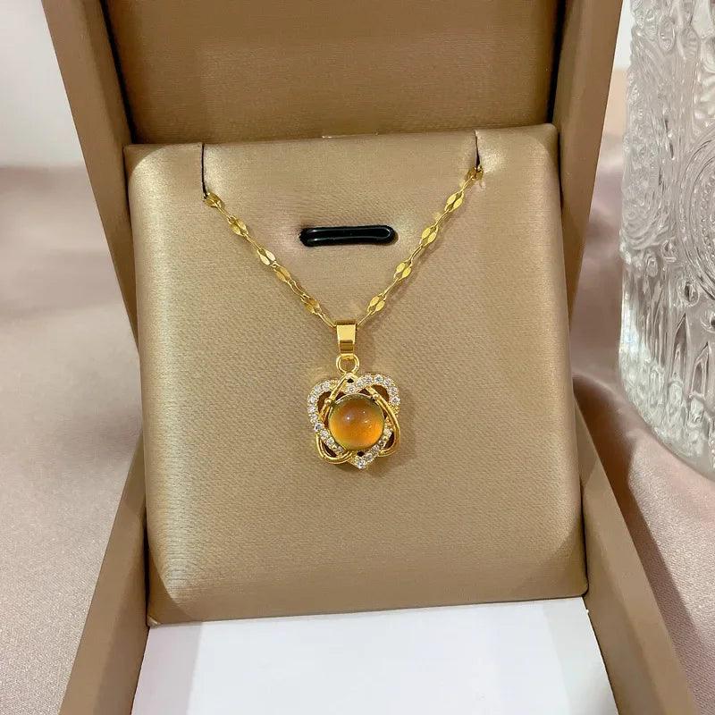 Colar pedra do humor - Coração entrelaçado cravejado - Banhado a ouro 18k